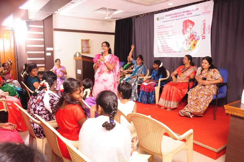 International Women’s Day Celebration 2026 in Thanjavur, organised by Thaaikarangal Charitable Trust with Rotary Club of Thanjavur Divas, showing a speaker addressing visually impaired women participants on stage with guests seated and audience engaged during an inclusive empowerment event International Women’s Day Celebration 2026 in Thanjavur, organised by Thaaikarangal Charitable Trust with Rotary Club of Thanjavur Divas, showing a speaker addressing visually impaired women participants on stage with guests seated and audience engaged during an inclusive empowerment event