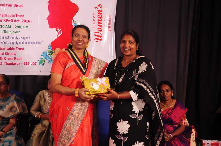 Guest being felicitated with a gift on stage during the International Women’s Day Celebration 2026 in Thanjavur, recognising contributions towards empowering visually impaired women Guest being felicitated with a gift on stage during the International Women’s Day Celebration 2026 in Thanjavur, recognising contributions towards empowering visually impaired women