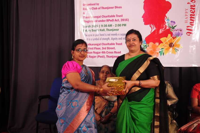 Guest being honoured with a gift on stage during the International Women’s Day Celebration 2026 in Thanjavur, recognising contributions towards empowering visually impaired women and promoting inclusion Guest being honoured with a gift on stage during the International Women’s Day Celebration 2026 in Thanjavur, recognising contributions towards empowering visually impaired women and promoting inclusion