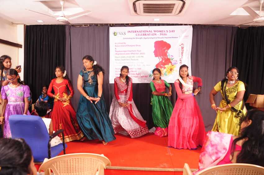 Visually impaired women performing a cultural dance on stage during the International Women’s Day Celebration 2026, showcasing talent, confidence, and joyful participation