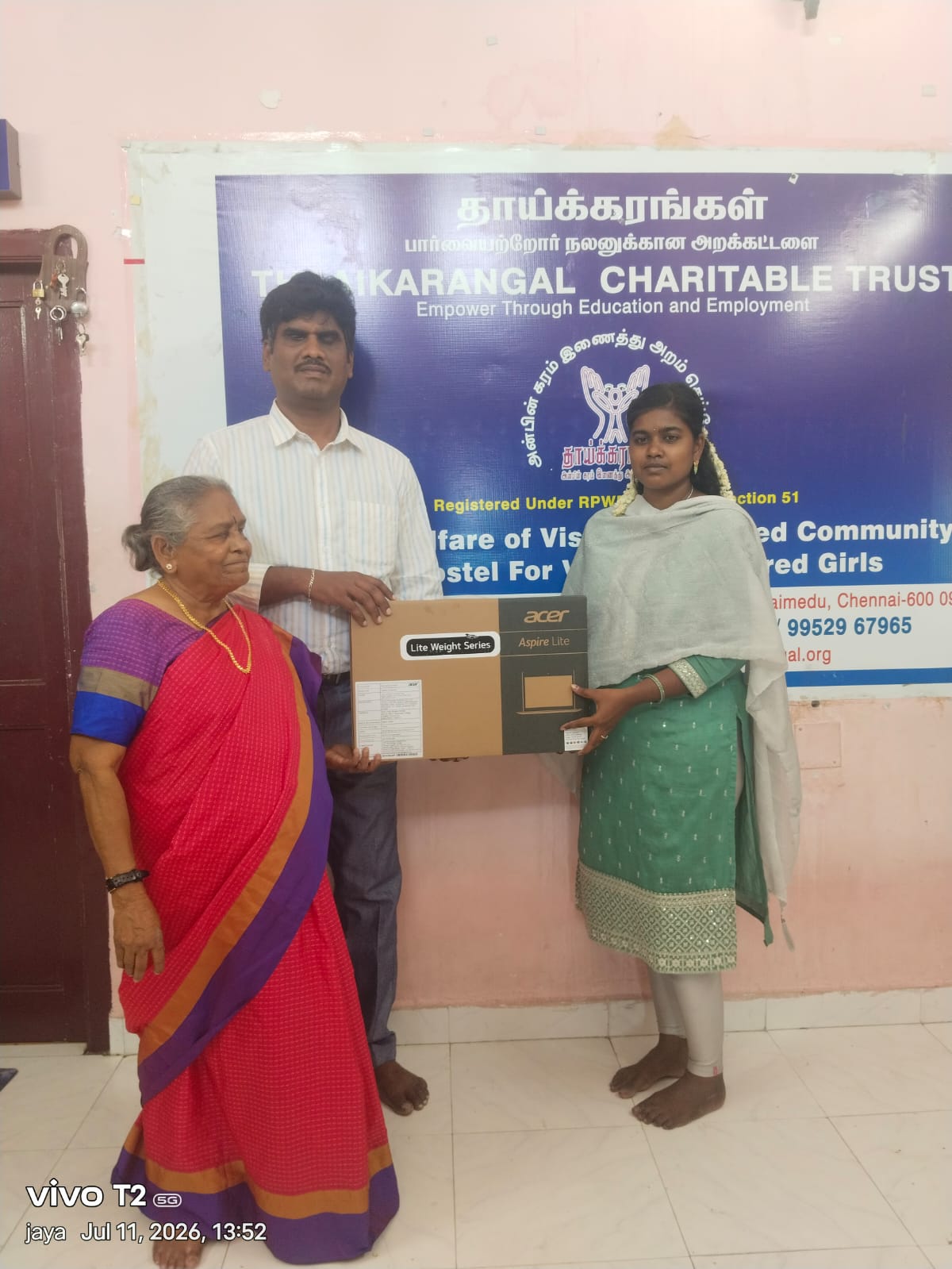 Thaaikarangal Charitable Trust staff and supporters present a laptop to a visually impaired female student at the Trust’s Digital Skilling Centre, supporting her higher education, digital learning and independent access to technology. Thaaikarangal Charitable Trust staff and supporters present a laptop to a visually impaired female student at the Trust’s Digital Skilling Centre, supporting her higher education, digital learning and independent access to technology.