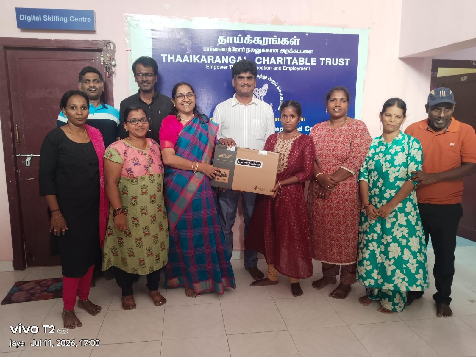 Thaaikarangal Charitable Trust presents a laptop to a visually impaired female student pursuing higher education, supporting her digital learning, computer skills and greater independence through access to technology.